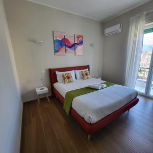 a bedroom with a large bed in a room at B&B Salerno Urban Suite 57 in Salerno