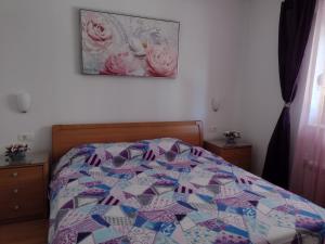 Кровать или кровати в номере Room Armani