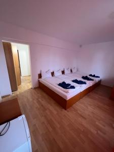 Postel nebo postele na pokoji v ubytování Hellen Residence