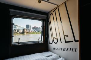 Een bed of bedden in een kamer bij Botel Maastricht