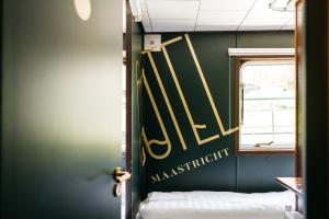 Een bed of bedden in een kamer bij Botel Maastricht