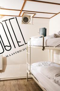 Een bed of bedden in een kamer bij Botel Maastricht