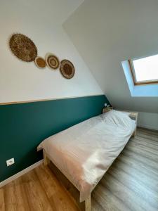 Voodi või voodid majutusasutuse Gîte Shaka toas