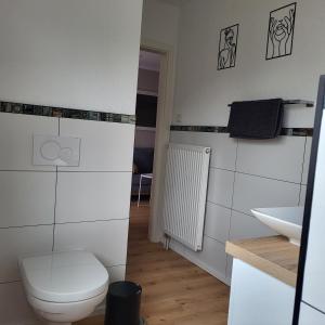 Ванная комната в Haus Valentonio