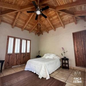 Postel nebo postele na pokoji v ubytování Cabaña en Cafetal de Coatepec