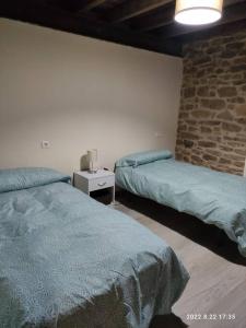 Posteľ alebo postele v izbe v ubytovaní Casa abuela Carmen