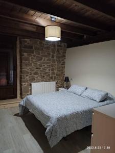 Posteľ alebo postele v izbe v ubytovaní Casa abuela Carmen