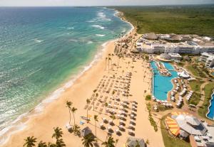an aerial view of the beach at a resort at Nickelodeon Hotels & Resorts Punta Cana - Gourmet All Inclusive by Karisma in Punta Cana