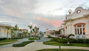 a view of a building with a courtyard at Nickelodeon Hotels & Resorts Punta Cana - Gourmet All Inclusive by Karisma in Punta Cana
