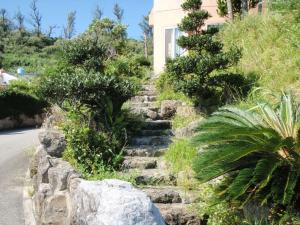 a set of stone steps leading to a house at Amakara okinawa - Vacation STAY 85516v in Yohena