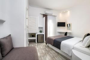 Postel nebo postele na pokoji v ubytování Alizea Villas & Suites