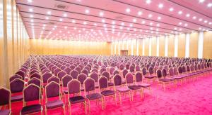 a large room with rows of chairs in it at CCULB Resort & Convention Hall in Gazipur +40 photos