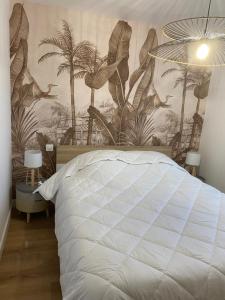Posteľ alebo postele v izbe v ubytovaní Villa Les Sables