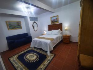Voodi või voodid majutusasutuse Hotel Boutique Casona Mashei toas