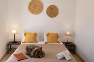 Postel nebo postele na pokoji v ubytování Riad Agathe & Spa