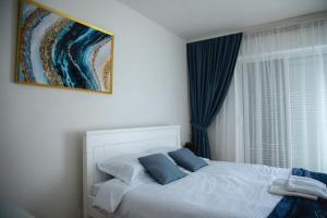 Katil atau katil-katil dalam bilik di FOR-A Apartmani