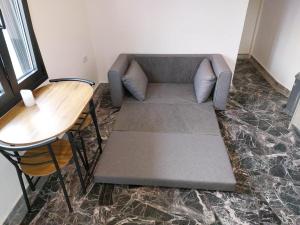 A seating area at Helios Stays - Sisi Private Apartments