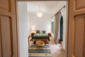 Postel nebo postele na pokoji v ubytování Riad Agathe & Spa