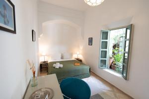 Postel nebo postele na pokoji v ubytování Riad Agathe & Spa