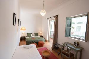 Postel nebo postele na pokoji v ubytování Riad Agathe & Spa