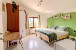 Postel nebo postele na pokoji v ubytování Maeva Guesthouse