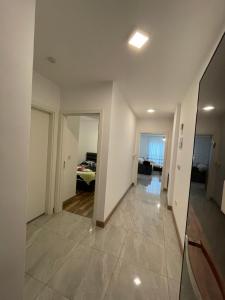 a hallway of a house with a bedroom at Girnenin kalbinde tatil in Kérynia