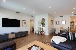 A television and/or entertainment centre at RAMBLA POBLENOU Luxury