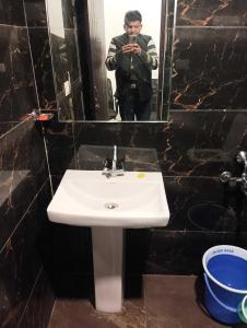 Koupelna v ubytování Hotel O Shubkamna