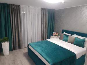 Postel nebo postele na pokoji v ubytování GREY VILLAS
