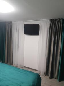 Postel nebo postele na pokoji v ubytování GREY VILLAS