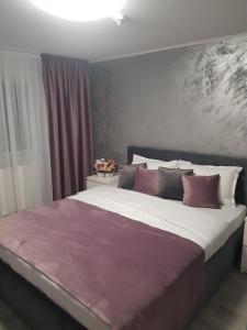 Postel nebo postele na pokoji v ubytování GREY VILLAS