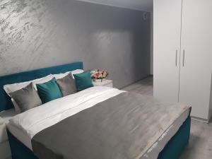 Postel nebo postele na pokoji v ubytování GREY VILLAS
