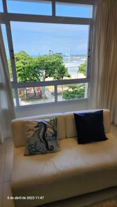 Posezení v ubytování Apartamento pé na areia inteiro-4 quartos 3 cama casal ,4 camas solteiro-3 salas cozinha