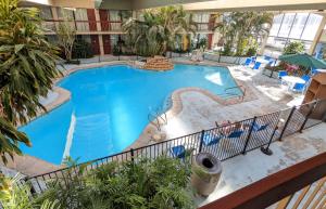 an overhead view of a swimming pool in a hotel at Red Roof Inn PLUS+ Wichita East in Wichita