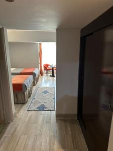 Letto o letti in una camera di Gawharet Al Ahram Hotel