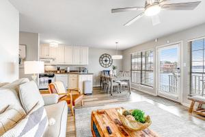 a living room with a couch and a table at Ledgerwood Point in Hot Springs