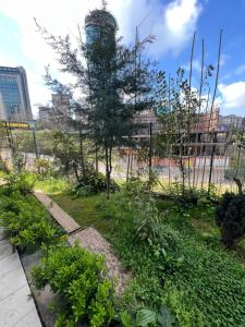 a garden with a tree in the middle at NEAR SUITES in Istanbul +5 photos