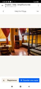 a screenshot of a room with bunk beds in it at Santa Pacha in Sucre