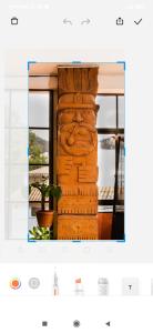 a picture of a stone column with a plant at Santa Pacha in Sucre