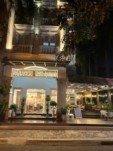 a store front of a hotel at night at Paragon Hotel PMH in Ho Chi Minh City