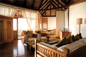 Istumisnurk majutusasutuses Coco Palm Dhuni Kolhu - 20 percent off roundtrip Seaplane for stays from 1 May to 30 September 2025
