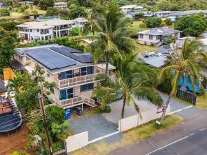 an aerial view of a house with palm trees at Ocean View Balcony Large Studio w extra Sofa Bed, contact us for price drop in Haleiwa