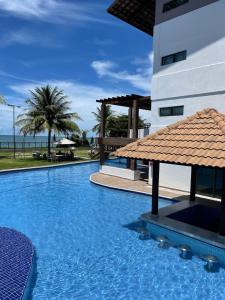 Πισίνα στο ή κοντά στο FLAT MAUI TAMANDARÉ