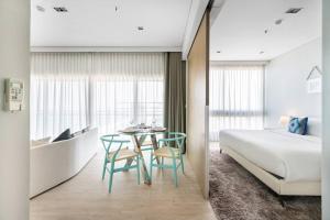 Postel nebo postele na pokoji v ubytování Veranda Residence/2BRFamilySuite + 31 fotografií