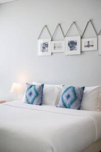 Postel nebo postele na pokoji v ubytování Veranda Residence/2BRFamilySuite