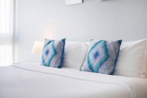 Postel nebo postele na pokoji v ubytování Veranda Residence/2BRFamilySuite
