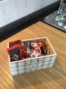 a box of food on a counter next to a sink at Truly Apulia in Bari