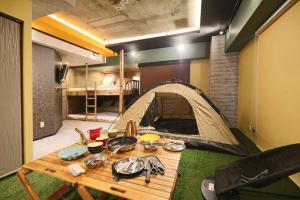 A seating area at MolinHotels506 アクティビティを満喫できる札幌定山渓 天然温泉付- CampRoom S-Beds6