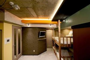 A bed or beds in a room at MolinHotels506 アクティビティを満喫できる札幌定山渓 天然温泉付- CampRoom S-Beds6 Még 37 kép