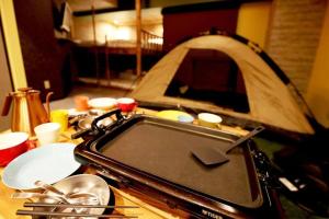 Kép MolinHotels506 アクティビティを満喫できる札幌定山渓 天然温泉付- CampRoom S-Beds6 szállásáról Dzsozankeiben a galériában